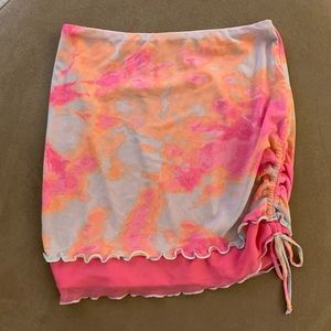 neon color mini skirt with bow detail